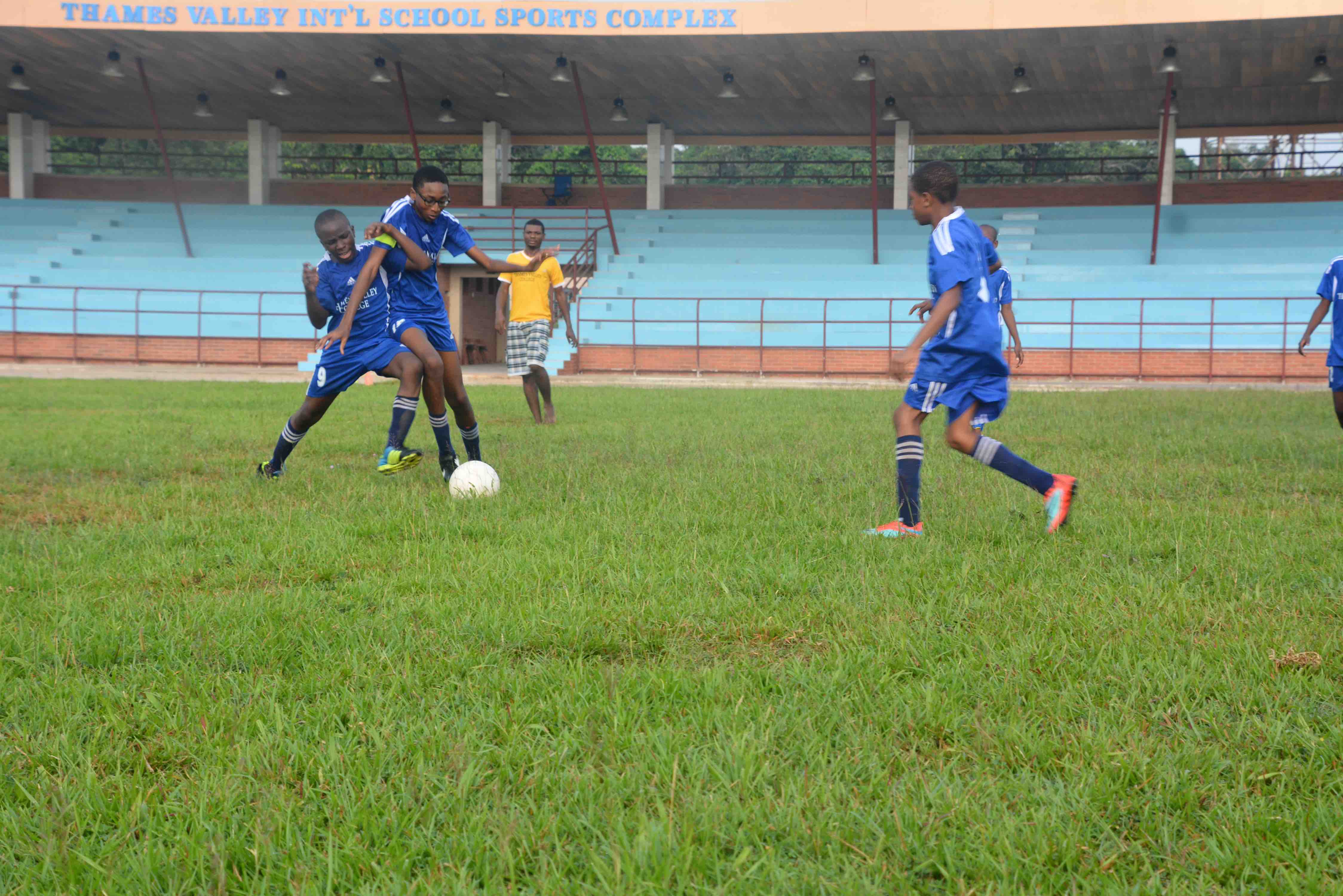 Modern sports facilities including basketball court and field