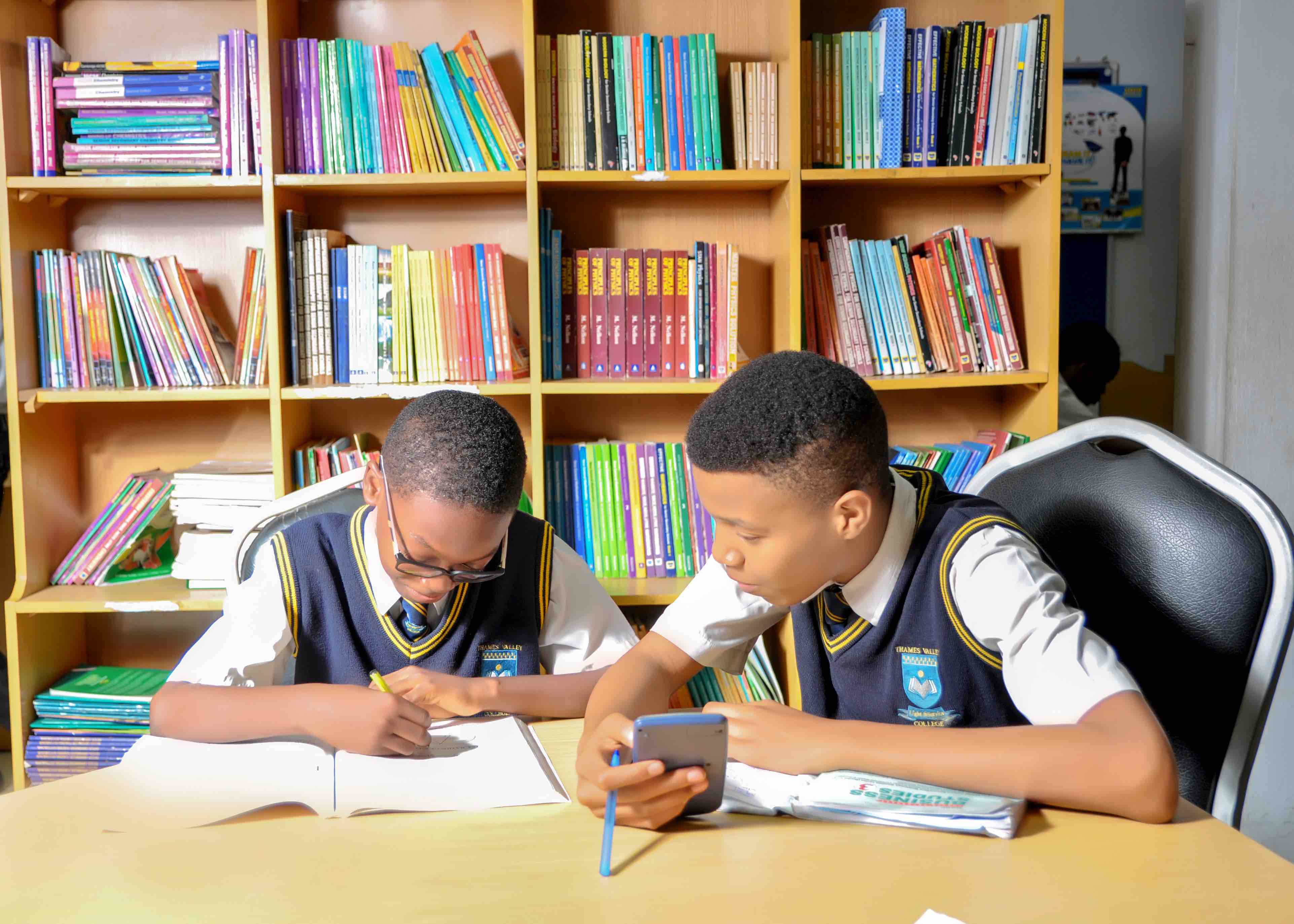 Spacious library with extensive book collection and study areas